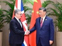 习近平会见英国首相斯塔默