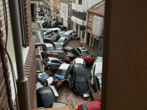 中国男子自驾探亲遇西班牙洪灾：当地华侨华人积极捐款捐物